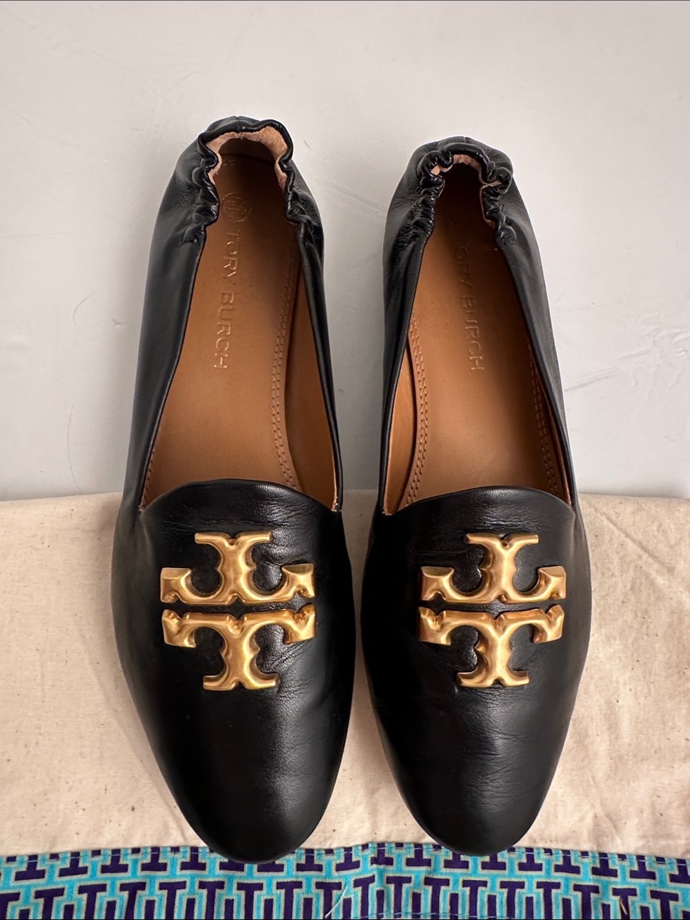 Tory Burch Eleanor black goat leather loafers with gold tone metal logo 9